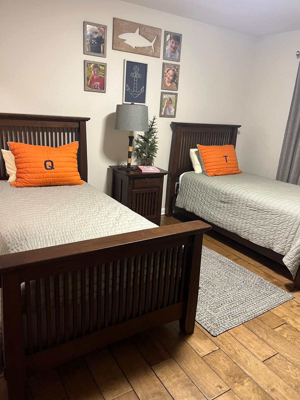 Dark wood twin-sharing bedroom visual